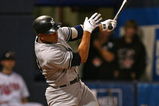 MINNEAPOLIS - OCTOBER 11: Alex Rodriguez #13 of the New York Yankees hits a solo home run in the 7th inning against the Minnesota Twins in Game Three of the ALDS during the 2009 MLB Playoffs at the Hubert H. Humphrey Metrodome on October 11, 2009 in Minneapolis, Minnesota. (Photo by Jonathan Daniel/Getty Images)