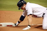 MINNEAPOLIS, MN - OCTOBER 11: Nick Punto #8 of the Minnesota Twins lingered at third base after being caught between third and home and getting out against the New York Yankees in the eighth inning in Game Three of the ALDS during the 2009 MLB Playoffs at the Hubert H. Humphrey Metrodome on October 11, 2009 in Minneapolis, Minnesota. (Photo by Genevieve Ross/Getty Images)