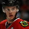 CHICAGO - MAY 22:  Jonathan Toews #19 of the Chicago Blackhawks looks on against the Detroit Red Wings during Game Three of the Western Conference Championship Round of the 2009 Stanley Cup Playoffs on May 22, 2009 at the United Center in Chicago, Illinois. The Blackhawks won 4-3 in overtime.  (Photo by Jonathan Daniel/Getty Images)