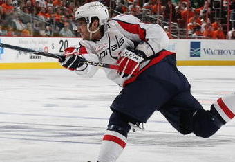 PHILADELPHIA - OCTOBER 06: Alex Ovechkin #8 of the Washington Capitals fires a third period shot against the Phildelphia Flyers at the Wachovia Center on October 6, 2009 in Philadelphia, Pennsylvania.  The Flyers defeated the Capitals 6-5. (Photo by Bruce Bennett/Getty Images)