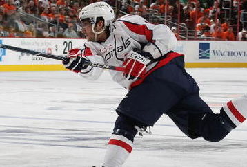 PHILADELPHIA - OCTOBER 06: Alex Ovechkin #8 of the Washington Capitals fires a third period shot against the Phildelphia Flyers at the Wachovia Center on October 6, 2009 in Philadelphia, Pennsylvania.  The Flyers defeated the Capitals 6-5. (Photo by Bruce Bennett/Getty Images)