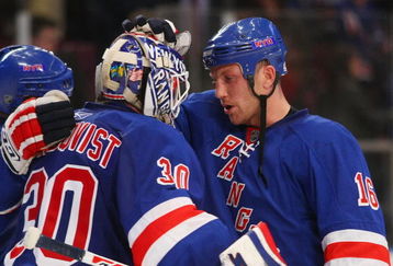 NEW YORK - APRIL 09: Henrik Lundqvist #30 of the New York Rangers is congratulated by Sean Avery #16 following a 2-1 defeat of the Philadelphia Flyers on April 9, 2009 at Madison Square Garden in New York City. The Rangers defeated the Flyers 2-1 to gain a playoff spot. (Photo by Bruce Bennett/Getty Images)