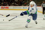 DENVER - OCTOBER 03:  Daniel Sedin #22 of the Vancouver Canucks takes a shot against the Colorado Avalanche during NHL action at the Pepsi Center on October 3, 2009 in Denver, Colorado. The Avalanche defeated the Canucks 3-0.  (Photo by Doug Pensinger/Getty Images)