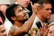 LAS VEGAS - MAY 02: Manny Pacquiao of the Philippines celebrates after knocking out Ricky Hatton of England in the second round during their junior welterweight title fight at the MGM Grand Garden Arena May 2, 2009 in Las Vegas, Nevada. (Photo by Ethan Miller/Getty Images)