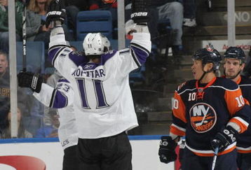 UNIONDALE, NY - OCTOBER 12: Anze Kopitar #11 of the Los Angeles Kings celebrates after scoring a second period goal as Richard Park #10 of the New York Islanders looks on at the Nassau Coliseum on October 12, 2009 in Uniondale, New York. (Photo by Bruce Bennett/Getty Images)