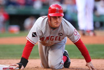 BOSTON - OCTOBER 11:  Pinch runner Reggie Willits #77 of the Los Angeles Angels of Anaheim reacts after being picked-off first base by pitcher Jonathan Papelbon #58 of the Boston Red Sox in the eighth inning of Game Three of the ALDS during the 2009 MLB Playoffs at Fenway Park on October 11, 2009 in Boston,  Massachusetts. (Photo by Jim Rogash/Getty Images)