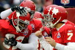 KANSAS CITY, MO - OCTOBER 11: Dwayne Bowe #82 of the Kansas City Chiefs is congratulated by teammates after scoring a touchdown to send the game into overtime during the game against the Dallas Cowboys on October 11, 2009 at Arrowhead Stadium in Kansas City, Missouri.  (Photo by Jamie Squire/Getty Images)