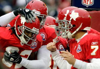 KANSAS CITY, MO - OCTOBER 11: Dwayne Bowe #82 of the Kansas City Chiefs is congratulated by teammates after scoring a touchdown to send the game into overtime during the game against the Dallas Cowboys on October 11, 2009 at Arrowhead Stadium in Kansas City, Missouri.  (Photo by Jamie Squire/Getty Images)