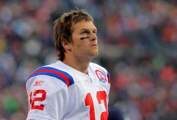 DENVER - OCTOBER 11:  Quarterback Tom Brady #12 of the New England Patriots looks on from the sidelines against the Denver Broncos during NFL action at Invesco Field at Mile High on October 11, 2009 in Denver, Colorado. The Broncos defeated the Patriots 20-17.  (Photo by Doug Pensinger/Getty Images)