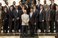 WASHINGTON - MAY 11:  University of North Carolina men's basketball head coach Roy Williams (L) and his team pose for photographs with U.S. President Barack Obama at the White House May 11, 2009 in Washington, DC. The North Carolina Tar Heels are the 2009 National Collegiate Athletic Association (NCAA) Division I national champions. A basketball fan, Obama picked the Tar Heels to win in his March Madness bracket.  (Photo by Chip Somodevilla/Getty Images)
