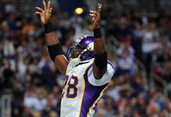 ST. LOUIS - OCTOBER 11:  :  Running back Adrian Peterson #28 of the Minnesota Vikings celebrates his touchdown against the St. Louis Rams at Edward Jones Dome on October 11, 2009 in St. Louis, Missouri.  (Photo by Ronald Martinez/Getty Images)