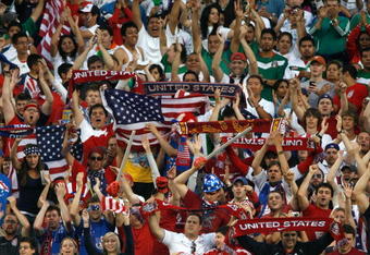CHICAGO - JULY 23:  Fans of the USA support their team after they won 2-0 against Honduras during their CONCACAF Cup Semifinal match at Soldier Field on July 23, 2009 in Chicago, Illinois.  (Photo by Brian Kersey/Getty Images)