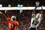 MIAMI - OCTOBER 12:  Wide receiver Braylon Edwards #17 of the New York Jets catches an apparent touchdown pass that was overturned on appeal over cornerback Vontae Davis #21 of the Miami Dolphins at Land Shark Stadium on October 12, 2009 in Miami, Florida. The Dolphins defeated the Jets 31-27.  (Photo by Doug Benc/Getty Images)