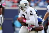 EAST RUTHERFORD, NJ - OCTOBER 11:  Justin Tuck #91 of the New York Giants sacks JaMarcus Russell #2 of the Oakland Raiders in the third quarter on October 11, 2009 at Giants Stadium in East Rutherford, New Jersey. The Giants defeated the Raiders 44-7.  (Photo by Jim McIsaac/Getty Images)
