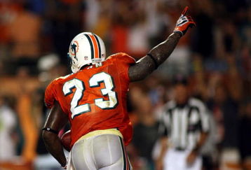 MIAMI - OCTOBER 12:  Running back Ronnie Brown #23 of the Miami Dolphins celebrates scoring the game winning touchdown against the New York Jets fans prior to their game at Land Shark Stadium on October 12, 2009 in Miami, Florida. Miami defeated New York 31-27.  (Photo by Marc Serota/Getty Images)