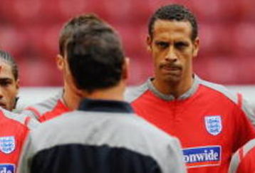 AMSTERDAM, NETHERLANDS - AUGUST 11: Ashley Cole, Frank Lampard, Rio Ferdinand and Wayne Rooney listen to England manager Fabio Capello  during the England Training Session at the Amsterdam Arena on August 11, 2009 in Amsterdam, Netherlands.  (Photo by Michael Regan/Getty Images)