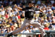 LOS ANGELES, CA - OCTOBER 04:  Pitcher Jason Marquis #21 of the Colorado Rockies throws a pitch against the Los Angeles Dodgers on October 4, 2009 at Dodger Stadium in Los Angeles, California.  The Dodgers won 5-3.  (Photo by Stephen Dunn/Getty Images)