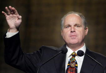 PHILADELPHIA - OCTOBER 2:  (FILE PHOTO)  Radio talk show host Rush Limbaugh gestures as he makes remarks at the National Association of Broadcasters October 2, 2003 in Philadelphia, Pennsylvania. Limbaugh admited to being addicted to painkillers October 10, a little over a week after resigning from his job at ESPN due to racial comments he made about Philadelphia Eagles Donovan McNabb.  (Photo by William Thomas Cain/Getty Images)