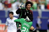 EAST RUTHERFORD, NJ - JULY 26:  Goalkeeper Guillermo Ochoa #1 and Juan Carlos Valenzuela #21 of Mexico celebrate 5-0 win over the United States in the CONCACAF Gold Cup Championship match at Giants Stadium on July 26, 2009 in East Rutherford, New Jersey.  (Photo by Jeff Zelevansky/Getty Images)