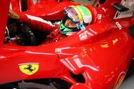 BUDAPEST, HUNGARY - JULY 25:  Felipe Massa of Brazil and Ferrari prepares to drive during the final practice session prior to qualifying for the Hungarian Formula One Grand Prix at the Hungaroring on July 25, 2009 in Budapest, Hungary.  (Photo by Mark Thompson/Getty Images)