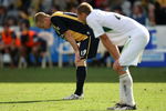 GOSFORD, AUSTRALIA - OCTOBER 11:  Matthew Simon of the Mariners and Rostyn Griffiths of the Fury show their frustration after thier draw in the round 10 A-League match between the Central Coast Mariners and the North Queensland Fury at Bluetongue Stadium on October 11, 2009 in Gosford, Australia.  (Photo by Mark Kolbe/Getty Images)