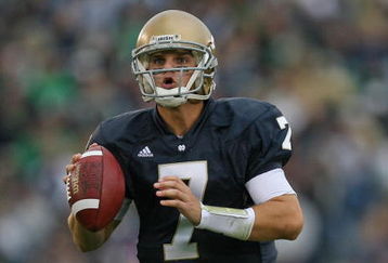 SOUTH BEND, IN - OCTOBER 03: Jimmy Clausen #7 of the Notre Dame Fighting Irish looks for a receiver against the Washington Huskies on October 3, 2009 at Notre Dame Stadium in South Bend, Indiana. Notre Dame defeated Washington 37-30 in overtime. (Photo by Jonathan Daniel/Getty Images)