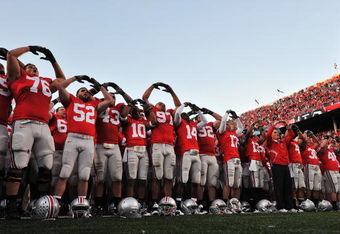 COLUMBUS, OH - OCTOBER 10:  The Ohio State Buckeyes sing their alma mater, Carmen Ohio, after defeating the Wisconsin Badgers 31-13 at Ohio Stadium on October 10, 2009 in Columbus, Ohio.  (Photo by Jamie Sabau/Getty Images)