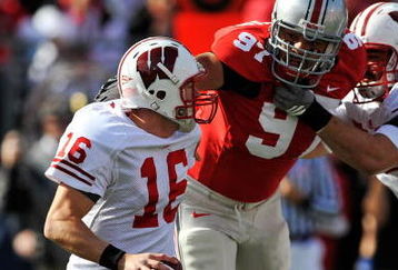 COLUMBUS, OH - OCTOBER 10:  Cameron Heyward #97 of the Ohio State Buckeyes applies pressure to quarterback Scott Tolzien #16 of the Wisconsin Badgers at Ohio Stadium on October 10, 2009 in Columbus, Ohio.  (Photo by Jamie Sabau/Getty Images)