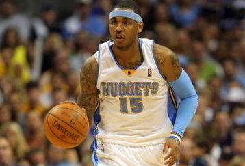 DENVER - MAY 29:  Carmelo Anthony #15 of the Denver Nuggets moves the ball in Game Six of the Western Conference Finals during the 2009 NBA Playoffs against the Los Angeles Lakers at Pepsi Center on May 29, 2009 in Denver, Colorado. NOTE TO USER: User expressly acknowledges and agrees that, by downloading and or using this photograph, User is consenting to the terms and conditions of the Getty Images License Agreement.  (Photo by Doug Pensinger/Getty Images)