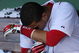 BOSTON - OCTOBER 11:  Cacther Victor Martinez #41 of the Boston Red Sox sits in the dugout after losing to the Los Angeles Angels of Anaheim 7-6 in Game Three of the ALDS during the 2009 MLB Playoffs at Fenway Park on October 11, 2009 in Boston,  Massachusetts. (Photo by Jim Rogash/Getty Images)