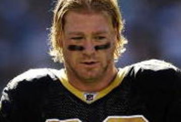 PHILADELPHIA - SEPTEMBER 20:  Jeremy Shockey #88 talks with Reggie Bush #25 of the New Orleans Saints during a timeout in a game against the Philadelphia Eagles at Lincoln Financial Field on September 20, 2009 in Philadelphia, Pennsylvania.  (Photo by Jeff Zelevansky/Getty Images)