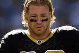 PHILADELPHIA - SEPTEMBER 20:  Jeremy Shockey #88 talks with Reggie Bush #25 of the New Orleans Saints during a timeout in a game against the Philadelphia Eagles at Lincoln Financial Field on September 20, 2009 in Philadelphia, Pennsylvania.  (Photo by Jeff Zelevansky/Getty Images)