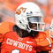 STILLWATER, OK - SEPTEMBER 5:  Wide receiver Dez Bryant #1 of the Oklahoma State Cowboys celebrates his touchdown with teammate Dexter Pratt #22 during the second quarter of the game against the Georgia Bulldogs at Boone Pickens Stadium on September 5, 2009 in Stillwater, Oklahoma. (Photo by Christian Petersen/Getty Images)