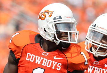 STILLWATER, OK - SEPTEMBER 5:  Wide receiver Dez Bryant #1 of the Oklahoma State Cowboys celebrates his touchdown with teammate Dexter Pratt #22 during the second quarter of the game against the Georgia Bulldogs at Boone Pickens Stadium on September 5, 2009 in Stillwater, Oklahoma. (Photo by Christian Petersen/Getty Images)
