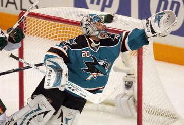 SAN JOSE, CA - OCTOBER 10:  Evgeni Nabokov #20 of the San Jose Sharks makes a diving save during their game against the Minnesota Wild at HP Pavilion on October 10, 2009 in San Jose, California.  (Photo by Ezra Shaw/Getty Images)