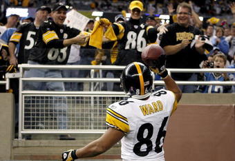 DETROIT , MI - OCTOBER 11:  Hines Ward #86 of the Pittsburgh Steelers celebrates a second quarter touchdown by throwing the ball to fans while playing the Detroit Lions on October 11, 2009 at Ford Field in Detroit, Michigan.  (Photo by Gregory Shamus/Getty Images)