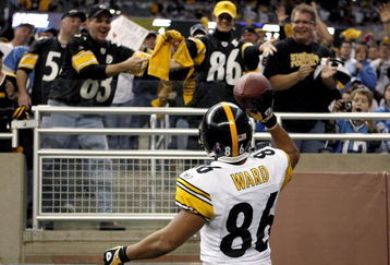 DETROIT , MI - OCTOBER 11:  Hines Ward #86 of the Pittsburgh Steelers celebrates a second quarter touchdown by throwing the ball to fans while playing the Detroit Lions on October 11, 2009 at Ford Field in Detroit, Michigan.  (Photo by Gregory Shamus/Getty Images)