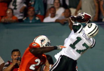 MIAMI - OCTOBER 12:  Receiver Braylon Edwards #17 of the New York Jets catches a pass against the Miami Dolphins at Land Shark Stadium on October 12, 2009 in Miami, Florida.  (Photo by Marc Serota/Getty Images)