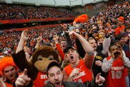 SYRACUSE, NY - FEBRUARY 16:  People cheer during the game between the Georgetown University Hoyas and the Syracuse Orange at the Carrier Dome February 16, 2008 in Syracuse, New York. (Photo by Marc Squire/Getty Images)
