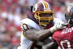 TAMPA, FL - NOVEMBER 25: Tackle Chris Samuels #60 of the Washington Redskins blocks against the Tampa Bay Buccaneers at the Raymond James Stadium on November 25, 2007 in Tampa, Florida.  The Bucs won 19-13. (Photo by Al Messerschmidt/Getty Images)
