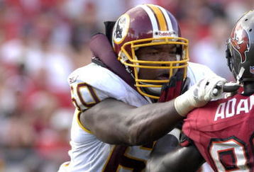 TAMPA, FL - NOVEMBER 25: Tackle Chris Samuels #60 of the Washington Redskins blocks against the Tampa Bay Buccaneers at the Raymond James Stadium on November 25, 2007 in Tampa, Florida.  The Bucs won 19-13. (Photo by Al Messerschmidt/Getty Images)