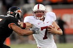 CORVALLIS,OR - OCTOBER 10: Running back Toby Gerhart #7 of the Stanford Cardinals is tackled by linebacker Cameron Collins #5 of the Oregon State Beaver  in the fourth quarter of the game at Reser Stadium on October 10, 2009 in Corvallis, Oregon. Gerhart was held to 96 yards and two touchdowns as the Beaver won the game 38-28(Photo by Steve Dykes/Getty Images)