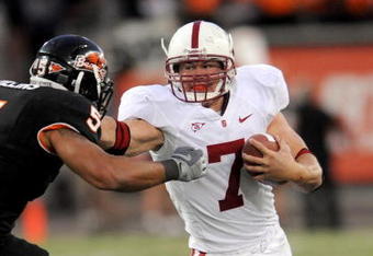 CORVALLIS,OR - OCTOBER 10: Running back Toby Gerhart #7 of the Stanford Cardinals is tackled by linebacker Cameron Collins #5 of the Oregon State Beaver  in the fourth quarter of the game at Reser Stadium on October 10, 2009 in Corvallis, Oregon. Gerhart was held to 96 yards and two touchdowns as the Beaver won the game 38-28(Photo by Steve Dykes/Getty Images)