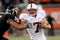 CORVALLIS,OR - OCTOBER 10: Running back Toby Gerhart #7 of the Stanford Cardinals is tackled by linebacker Cameron Collins #5 of the Oregon State Beaver  in the fourth quarter of the game at Reser Stadium on October 10, 2009 in Corvallis, Oregon. Gerhart was held to 96 yards and two touchdowns as the Beaver won the game 38-28(Photo by Steve Dykes/Getty Images)