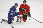 MISSISSAUGA, CANADA - AUGUST 26:  Tyler Bozak #86 of the Toronto Maple Leafs and Mikael Backlund  #60 of the Calgary Flames look on during the Upper Deck NHL Rookie Debut on August 26, 2009 at the Hershey Centre in Mississauga, Ontario.  (Photo By Dave Sandford/Getty Images)