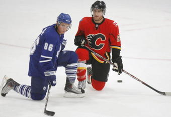 MISSISSAUGA, CANADA - AUGUST 26:  Tyler Bozak #86 of the Toronto Maple Leafs and Mikael Backlund  #60 of the Calgary Flames look on during the Upper Deck NHL Rookie Debut on August 26, 2009 at the Hershey Centre in Mississauga, Ontario.  (Photo By Dave Sandford/Getty Images)