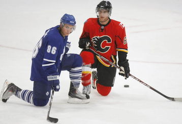 MISSISSAUGA, CANADA - AUGUST 26:  Tyler Bozak #86 of the Toronto Maple Leafs and Mikael Backlund  #60 of the Calgary Flames look on during the Upper Deck NHL Rookie Debut on August 26, 2009 at the Hershey Centre in Mississauga, Ontario.  (Photo By Dave Sandford/Getty Images)