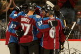 DENVER - SEPTEMBER 23:  The Colorado Avalanche celebrate a second-period goal by Milan Hejduk #23 to give the Avs a 2-0 lead as Peter Harrold #5 of the Los Angeles Kings skates away during preseason NHL action at the Pepsi Center on September 23, 2009 in Denver, Colorado.  (Photo by Doug Pensinger/Getty Images)