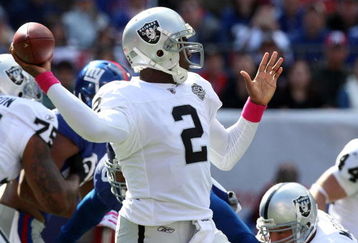 EAST RUTHERFORD, NJ - OCTOBER 11:  JaMarcus Russell #2 of the Oakland Raiders throws a pass against the New York Giants on October 11, 2009 at Giants Stadium in East Rutherford, New Jersey.  (Photo by Jim McIsaac/Getty Images)