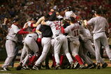 ST LOUIS - OCTOBER 27:   The Boston Red Sox celebrate on the field after defeating the St. Louis Cardinals 3-0 in game four of the World Series on October 27, 2004 at Busch Stadium in St. Louis, Missouri. (Photo by Jed Jacobsohn/Getty Images)